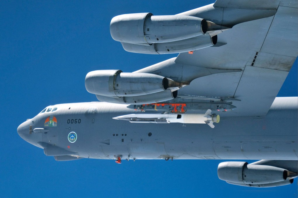 The X-51A WaveRider hypersonic flight test vehicle is seen under the wing of a B-52 Stratofortress during testing in March 2010. Photo: US Air Force via AFP