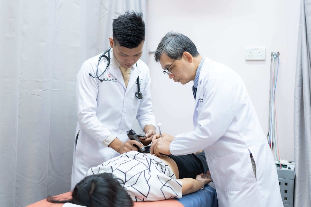 Dr Wong Lin Ho (L) and Professor Wong Pang Ong treat a patient with traditional Chinese medicine in Singapore clinic Ong Fujian Chinese Physician Hall. Photo: Facebook