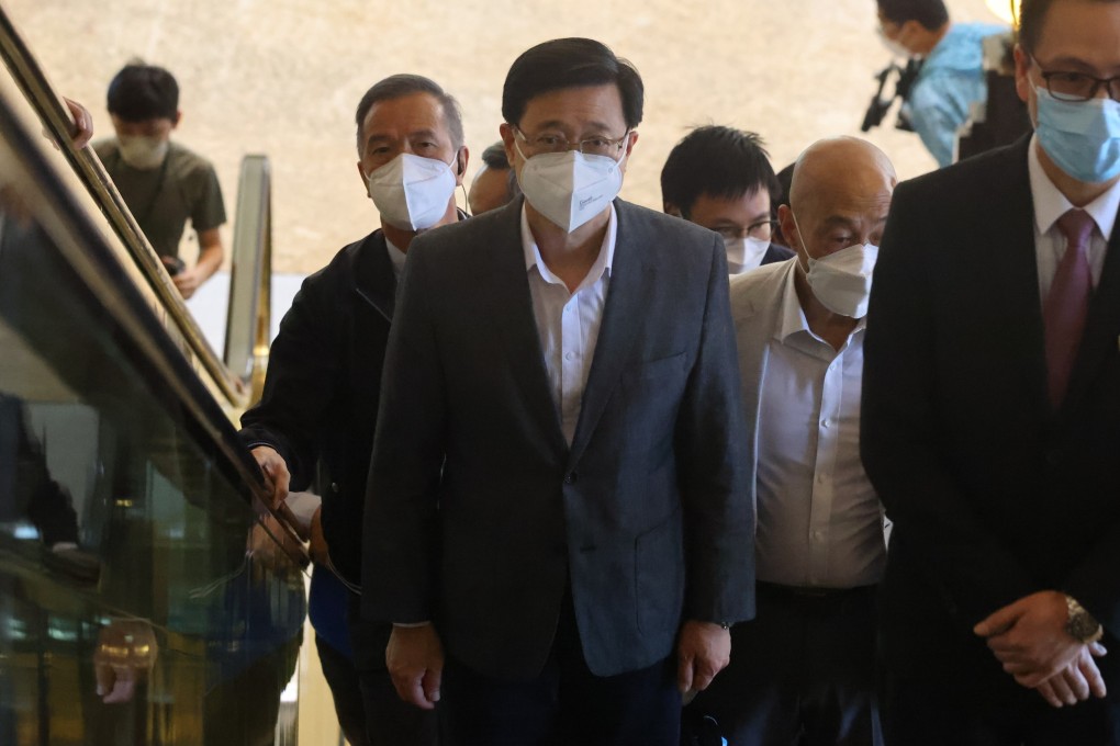John Lee meets the media at Central Plaza, Wan Chai, on April 8. Photo: Dickson Lee