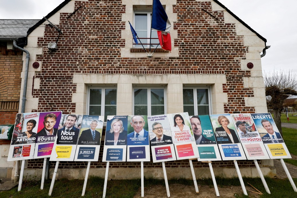 Official campaign posters of French presidential election candidates are seen on bulletin boards near the town hall in Appilly, France. Photo: Reuters