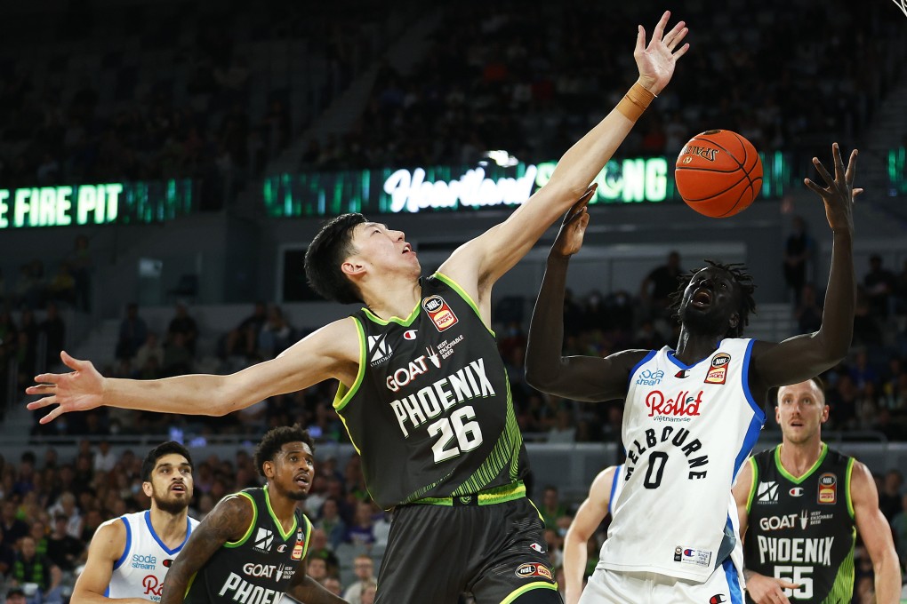 Zhou Qi contests the ball against United’s Jo Lual-Acuil during round 19 of the NBL season. Photo: Getty Images