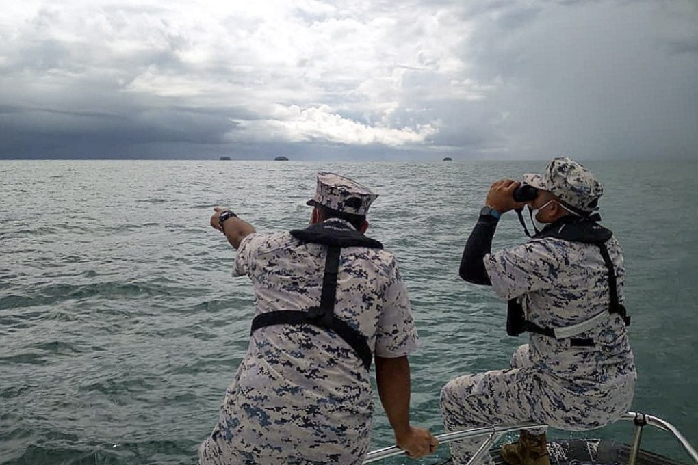 A rescue team searching for missing divers in Mersing, Malaysia, for the third day. Photo: EPA/EFE