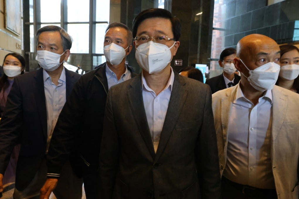 John Lee meets the media at Central Plaza in Wan Chai on Friday. Photo: Dickson Lee