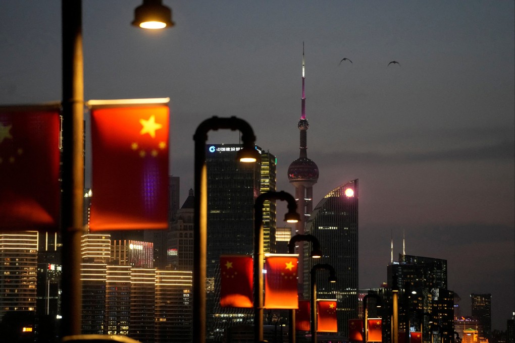 Birds fly above the Lujiazui financial district, amid the lockdown in Shanghai’s Pudong area on March 28, 2022. Photo: Reuters