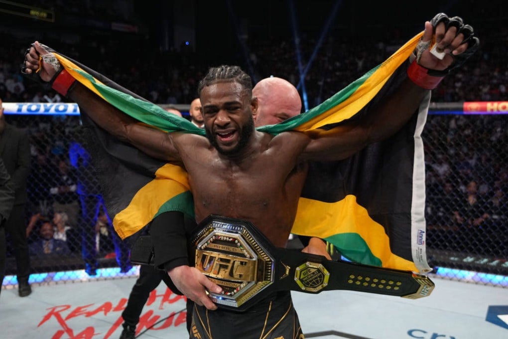 Aljamain Sterling celebrates after defeating Petr Yan in their UFC bantamweight championship fight at UFC 273. Photo: Zuffa LLC
