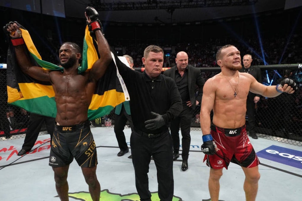 Aljamain Sterling celebrates after defeating Petr Yan in their UFC bantamweight championship fight at UFC 273. Photo: Jeff Bottari/Zuffa LLC