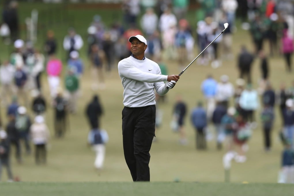 Tiger Woods watches his second shot on the first hole during the third round of the Masters golf tournament at Augusta National. Photo: AP