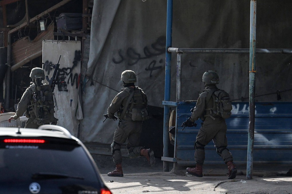 Israeli troops raid the Nur Shams refugee camp near the West Bank town of Tulkarem on April 10 looking for suspects related to a gunman from Jenin who went on a shooting rampage in a Tel Aviv nightlife area on April 7. Photo: AFP