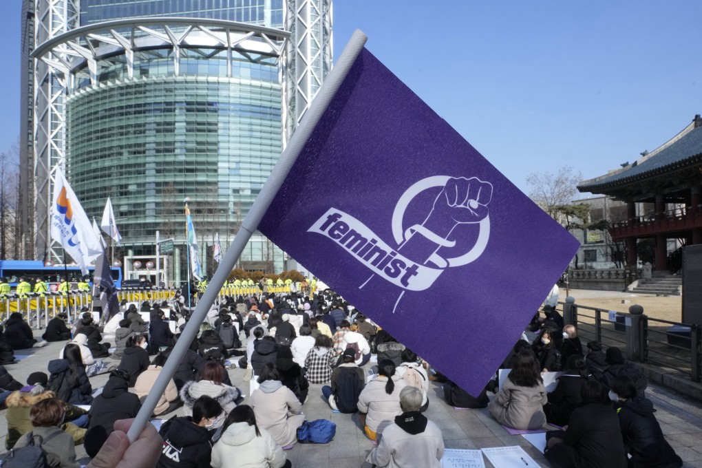 People stage a rally supporting feminism in Seoul on February 12, 2022. Photo: AP