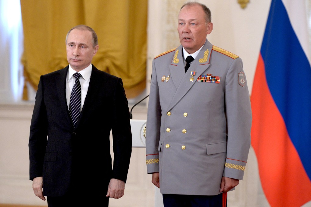 Russian President Vladimir Putin, left, and Colonel-General Alexander Dvornikov in Moscow, Russia in 2016.  Photo: Sputnik / Handout via Reuters