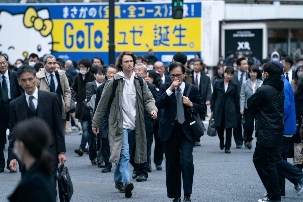 Ansel Elgort in a still from new HBO series Tokyo Vice, based on Jake Adelstein’s memoir Tokyo Vice: An American Reporter on the Police Beat in Japan.