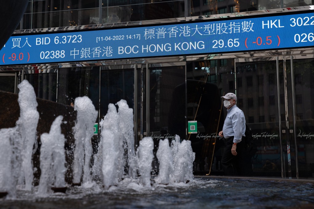 A man walks past Exchange Square in Central, Hong Kong on April 11. Photo: EPA-EFE