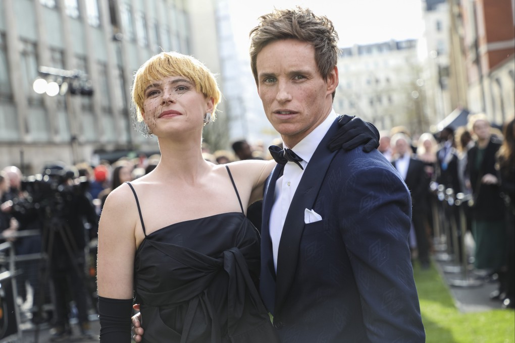 Jessie Buckley, left, and Eddie Redmayne arrive at the Olivier Awards in London on April 10. Photo: Invision / AP