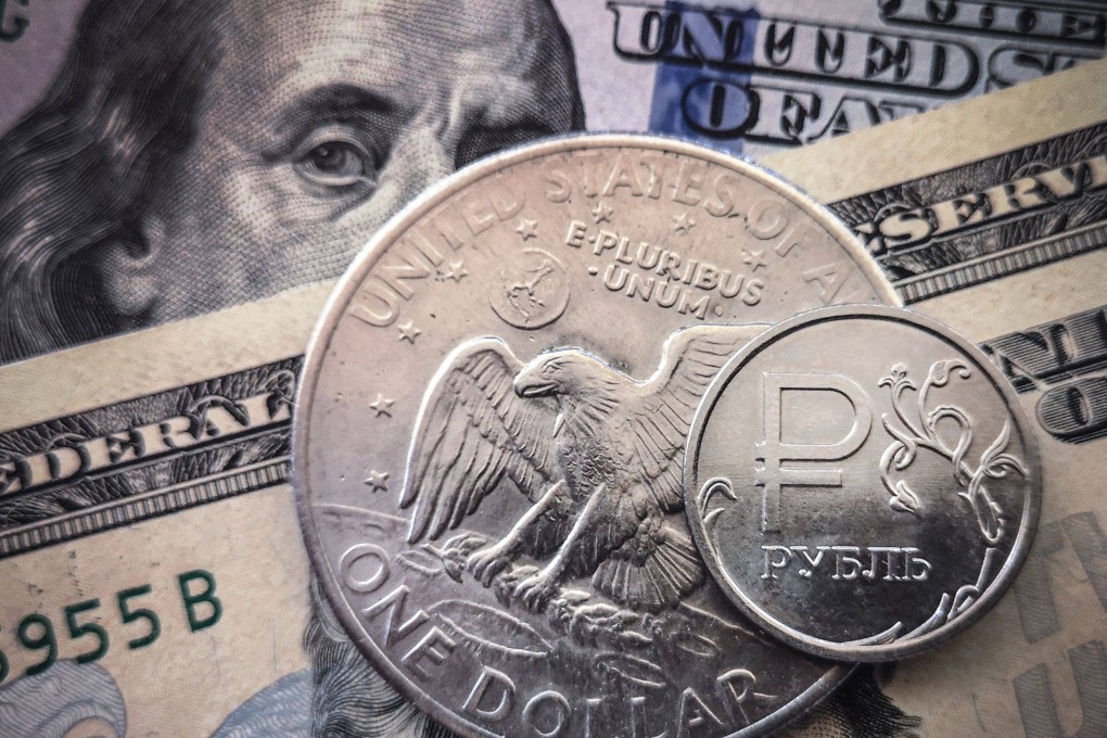 The US government has ‘weaponised’ the financial markets, a ‘stupid and crazy’ strategy that would undermine the US dollar’s status as the world’s reserve currency, said Joseph Yam Chi-kwong. Photo: AFP
