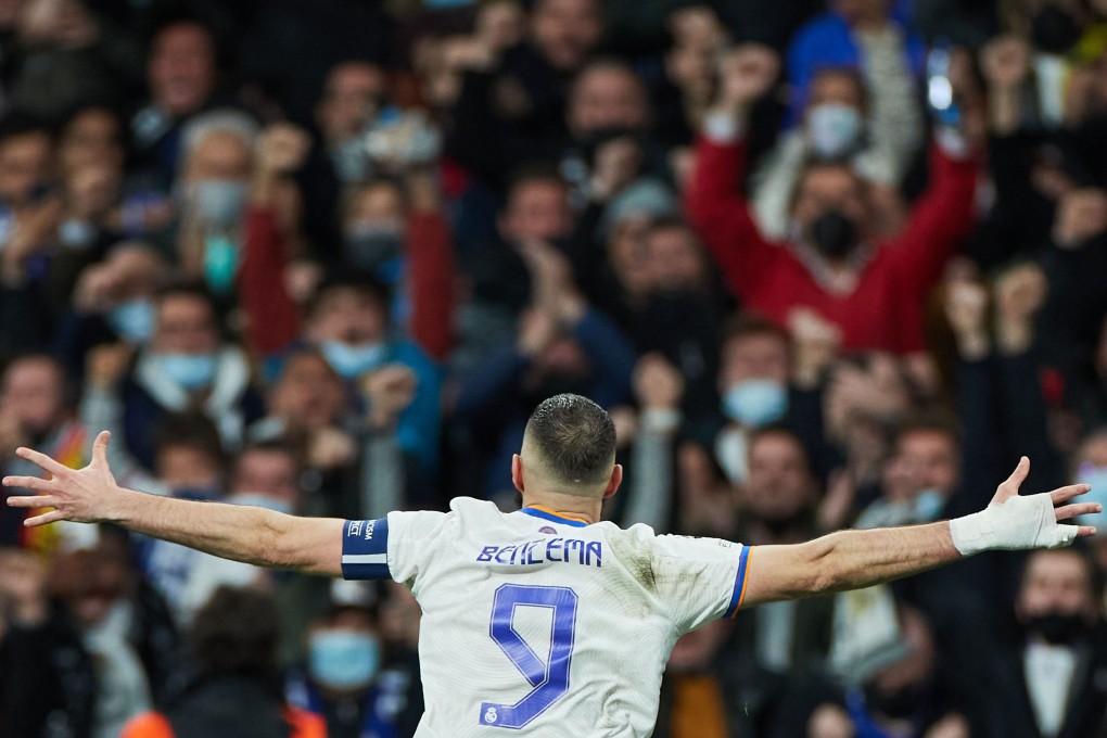 Karim Benzema of Real Madrid celebrates his extra-time goal against Chelsea. Photo: Xinhua/Meng Dingbo