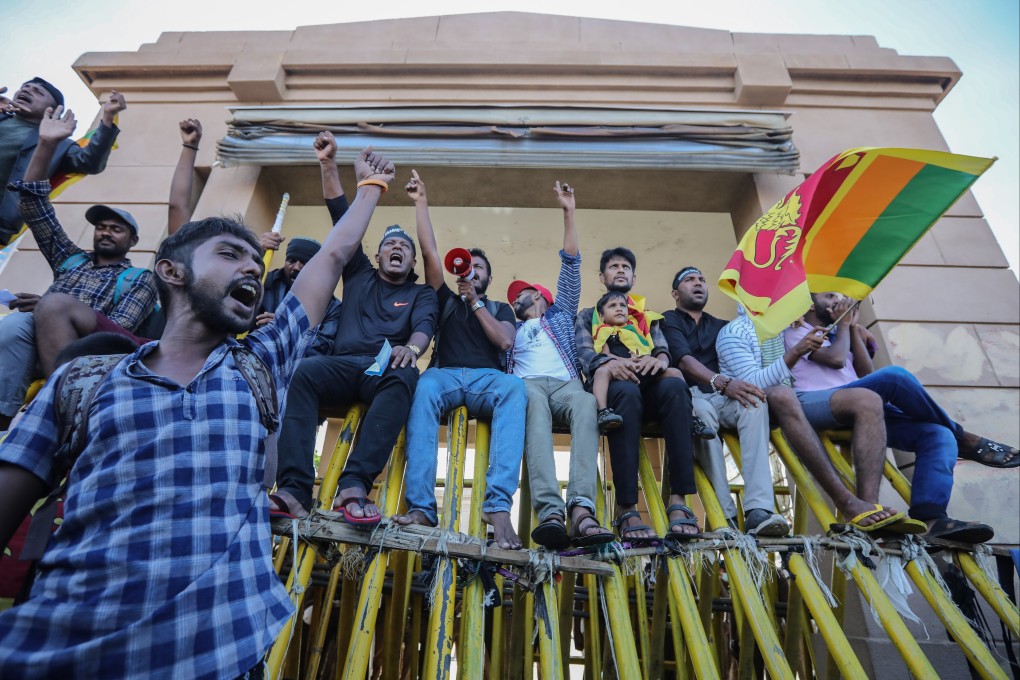 Protesters shout slogans in front of the presidential secretariat in Colombo, Sri Lanka on Thursday. Photo: EPA-EFE