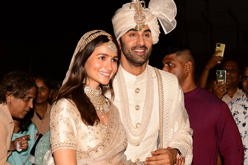 Bollywood actors Ranbir Kapoor and Alia Bhatt pose for pictures during their wedding ceremony in Mumbai. Photo: AFP