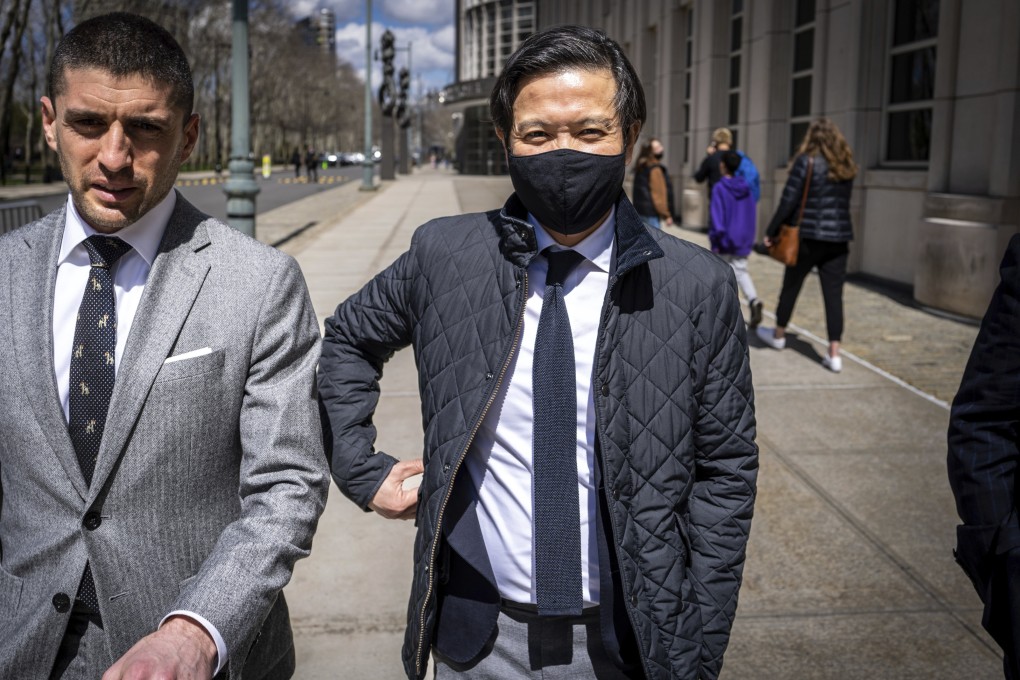 Ex-Goldman Sachs banker Roger Ng, right, exits a federal court in New York on April 8 after being found guilty of helping to embezzle money from Malaysia’s 1MDB sovereign wealth fund. Photo: AP