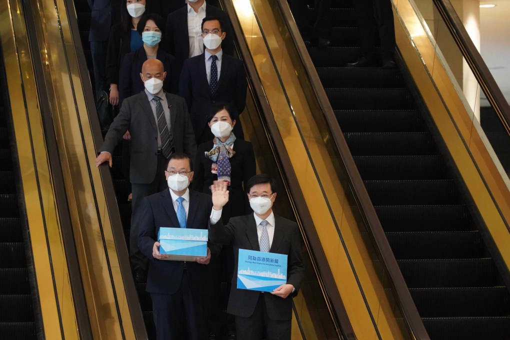 Chief executive hopeful John Lee Ka-chiu submits nominations for the election at City Gallery, Central, on April 13. Photo: Felix Wong
