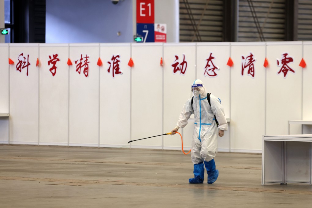 A staff member disinfects a makeshift hospital at the Shanghai New International Expo Center. The lockdown in China’s biggest city is affecting stock market sentiment. Photo: Xinhua
