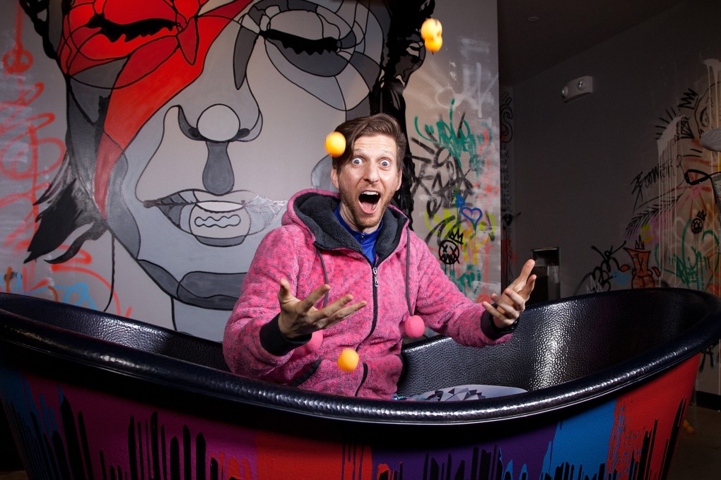 SAN FRANCISCO, CA - MAY 19:  Ping-pong professional Adam Bobrow poses for photos in the photobooth tub at the SPiN San Francisco Grand Opening on May 19, 2016 in San Francisco, California.  (Photo by Kelly Sullivan/WireImage)