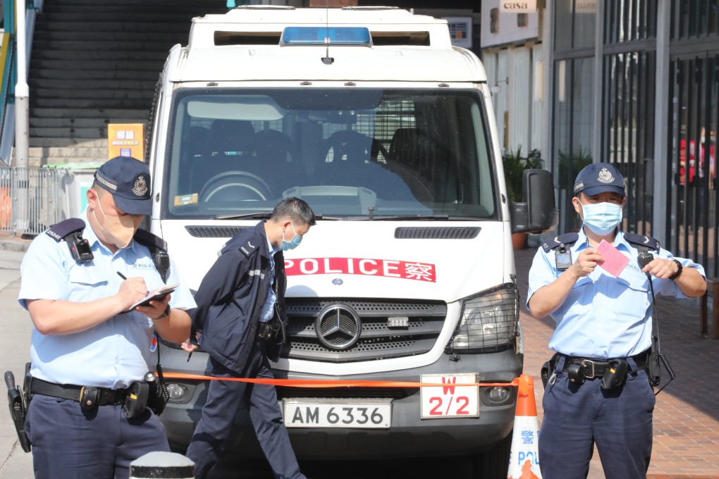 Police officers outside at the Liaison Office of the Central People’s Government in Sai Ying Pun. Photo: Jelly Tse