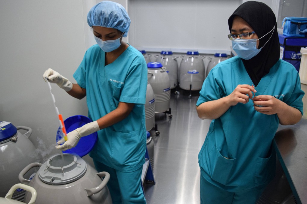 Staff at a fertility clinic in Kuala Lumpur demonstrate part of the procedure for freezing eggs. Photo: AFP