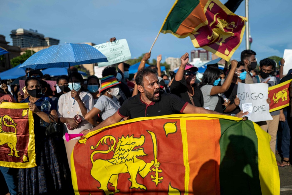 People shout slogans during an anti-government demonstration outside the president’s office in Colombo, Sri Lanka, on Friday. Photo: AFP