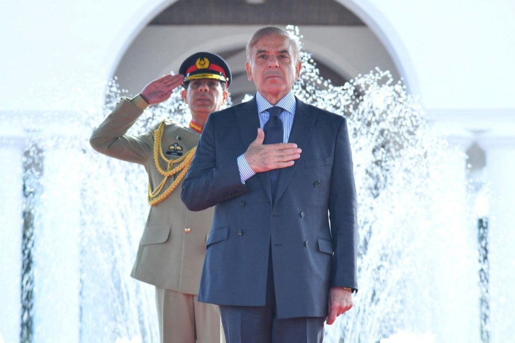 Pakistan’s new Prime Minister Shehbaz Sharif gestures during a guard of honour ceremony in Islamabad on Tuesday. Photo: Pakistan Press Information Department Handout via Reuters
