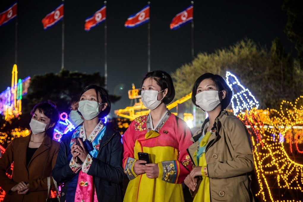 North Koreans at the ‘Light Festival’, held to celebrate the 110th birth anniversary of their late leader Kim Il Sung, in Pyongyang. Photo: AFP