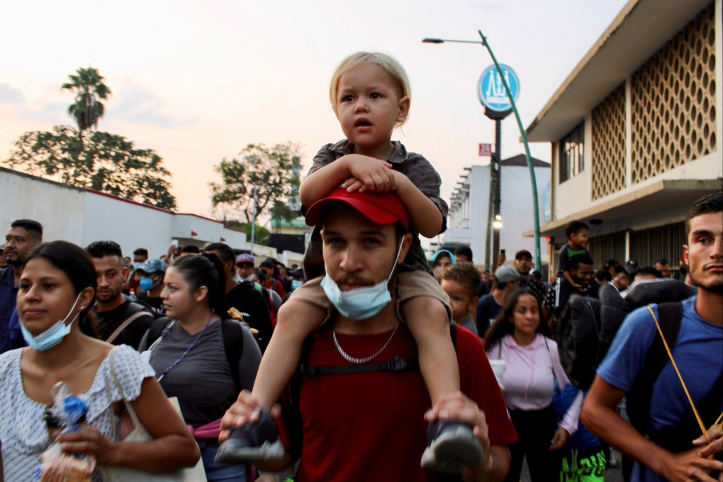 Migrants stranded in Tapachula take part in a caravan towards the US after growing impatient of waiting for the humanitarian visa to cross the country, in Tapachula, Mexico on April 16. Photo: Reuters
