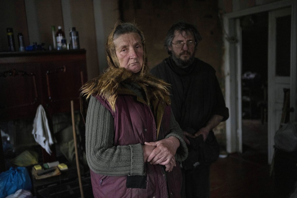Nadiya Trubchaninova, 70, and her son Oleg, 46, inside the room of her son Vadym, 48, who was killed by Russian soldiers in Bucha, near Kyiv, Ukraine. Nadiya is trying to bring Vadym’s body home for burial. Photo: AP