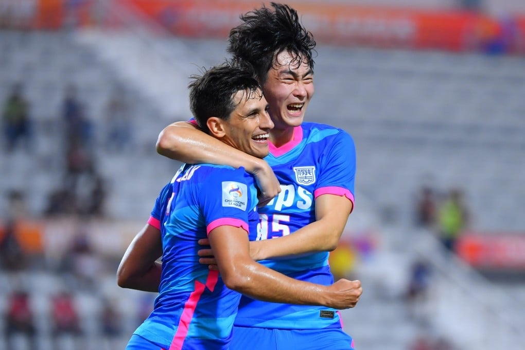 Kitchee midfielder Ruslan Mingazov (left) with defender Shinichi Chan after scoring against Chiangrai United in their AFC Champions League opener. Photo: Kitchee