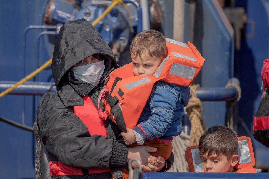Migrants arrive after crossing the English Channel in Dover, UK on April 15. Photo: EPA-EFE