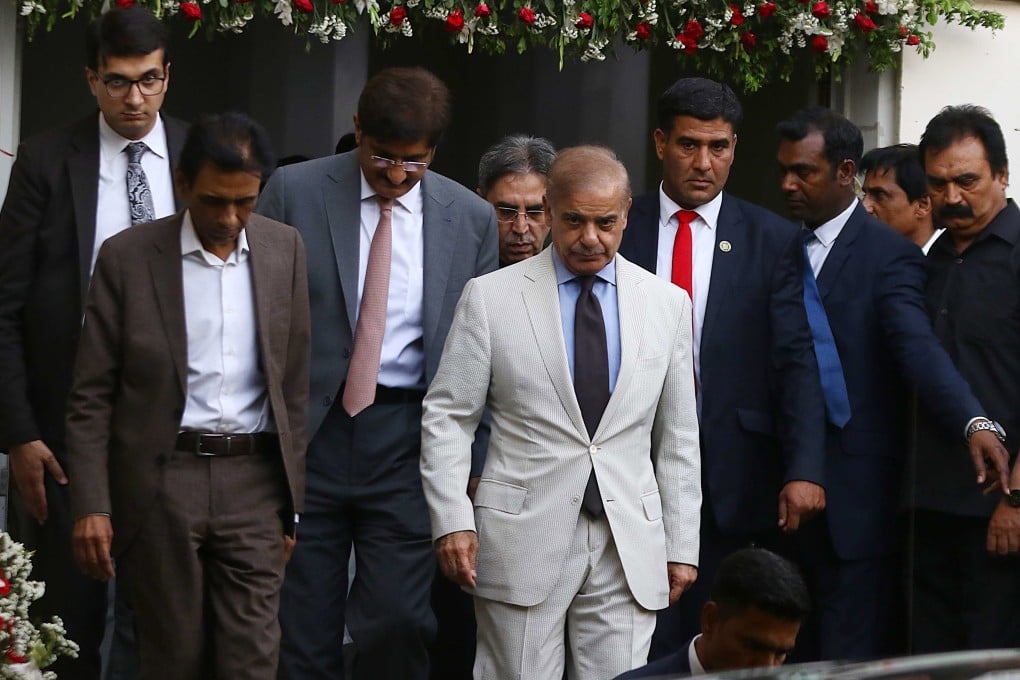 Pakistan’s Prime Minister Shehbaz Sharif, white suit, meeting leaders of his newly formed government in Karachi. Photo: EPA-EFE