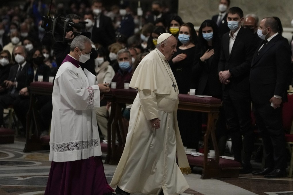 Pope Francis walks past Melitopol Mayor Ivan Fedorov, second from right, and Ukrainian politicians during an Easter vigil in St Peter’s Basilica at the Vatican on April 16. Photo: AP