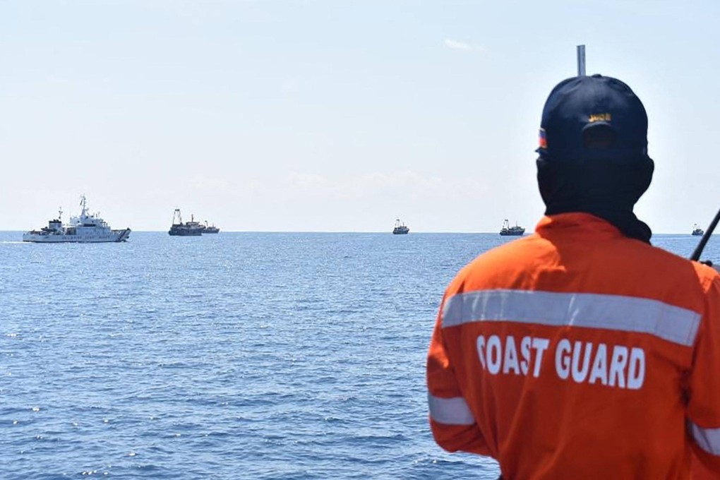 Philippine coastguard personnel monitor Chinese vessels at Sabina Shoal, a South China Sea outcrop claimed by Manila, on May 5, 2021. Photo: Philippine Coastguard/AFP