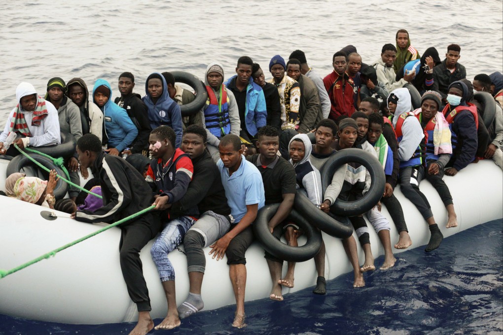 Migrants are brought to shore in Garaboli Libya, in October 2021. On Saturday, six migrants were found dead and 29 are missing and presumed dead after their boat capsized off the coast of Libya. Photo: AP