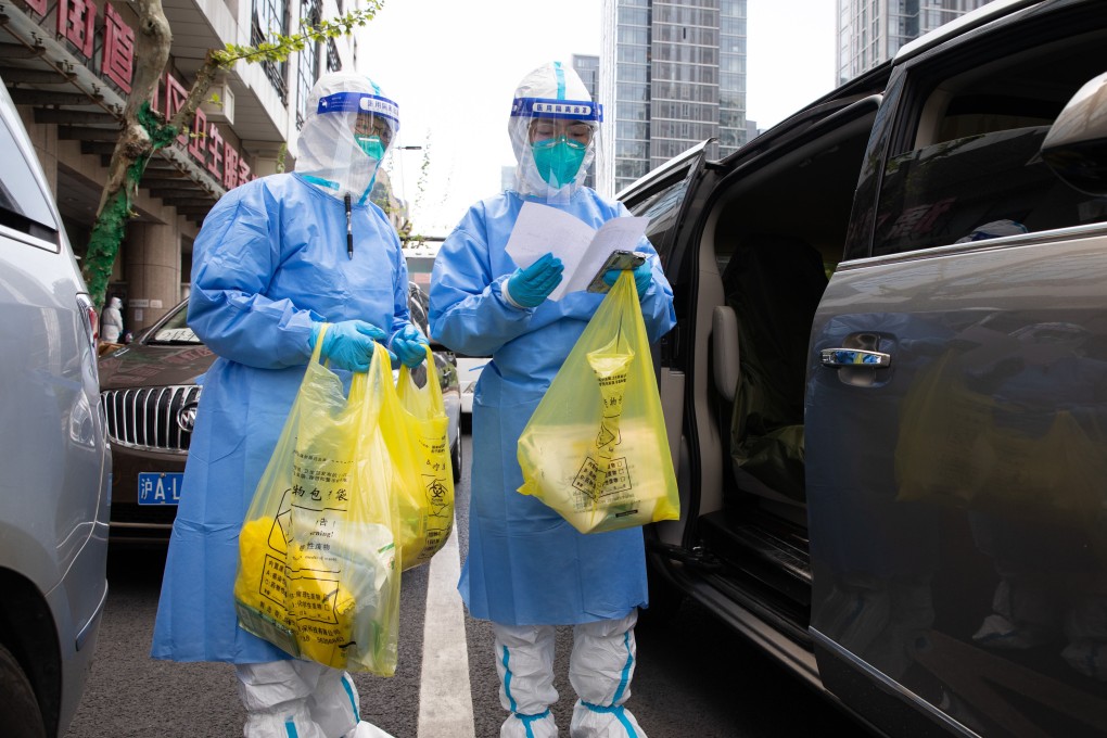 Medical workers in Yuyuan in Shanghai,. Photo: Xinhua