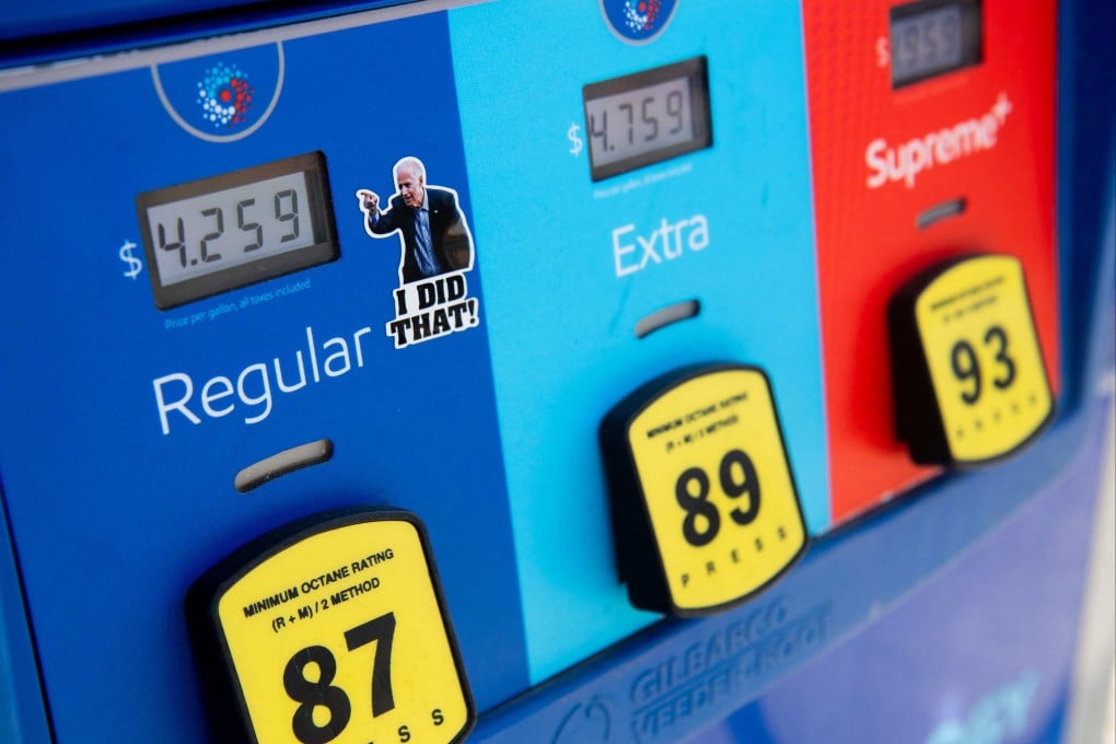Petrol prices and a sticker of US President Joe Biden at a station in Arlington, Virginia, on March 16. Toppling the stock market is seen as the lesser evil than the wealth-destroying potential of runaway inflation taking hold in the US, Europe and beyond. Photo: AFP