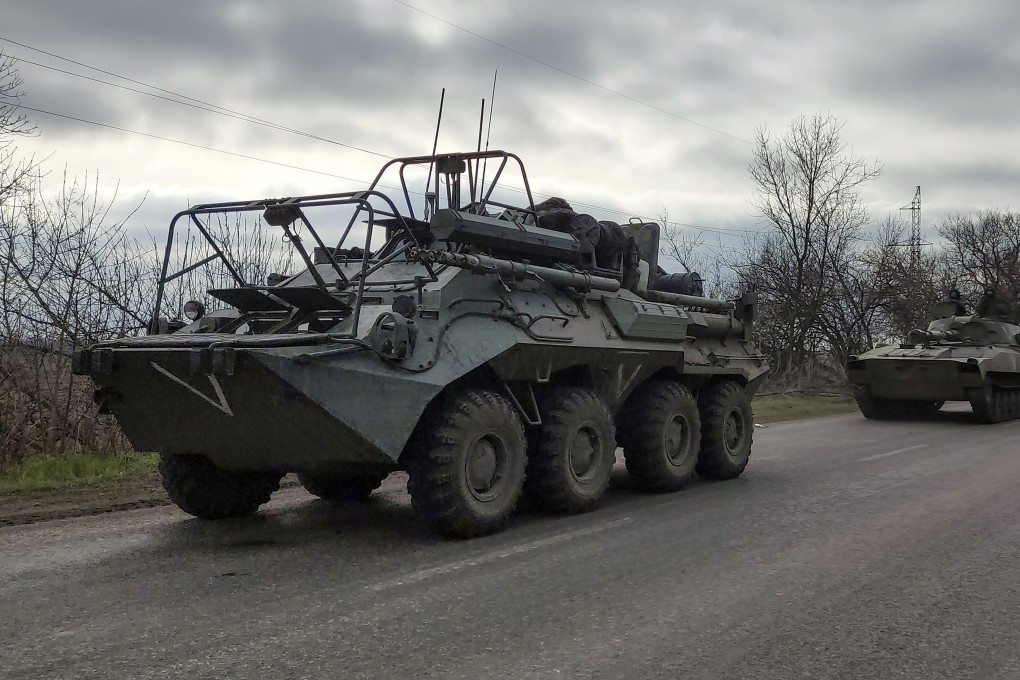 A Russian military convoy moves on a highway in an area controlled by Russian-backed separatist forces near Mariupol, Ukraine on Saturday. Photo: AP