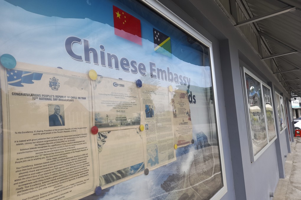 A display case of photos is seen outside Chinese Embassy in Honiara, Solomon Islands. Seeking to counter international fears over its new security alliance with China, the Solomon Islands said it won’t allow China to build a military base there. Photo: AP