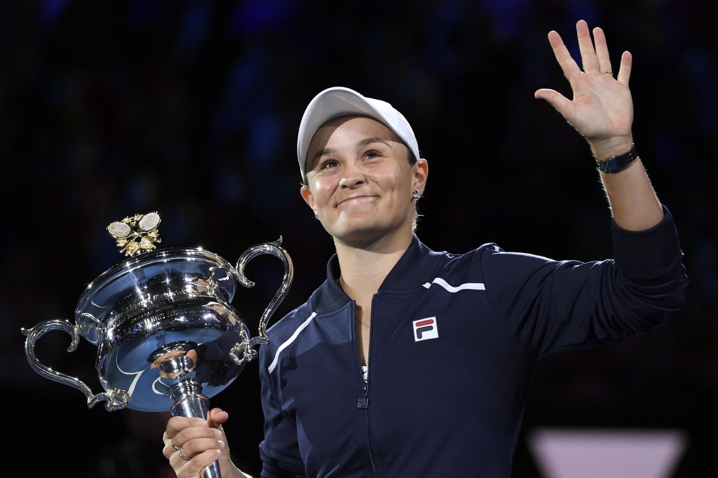 Ash Barty holds the Daphne Akhurst Memorial Cup after defeating Danielle Collins in the women’s singles final at the Australian Open. Photo: AP