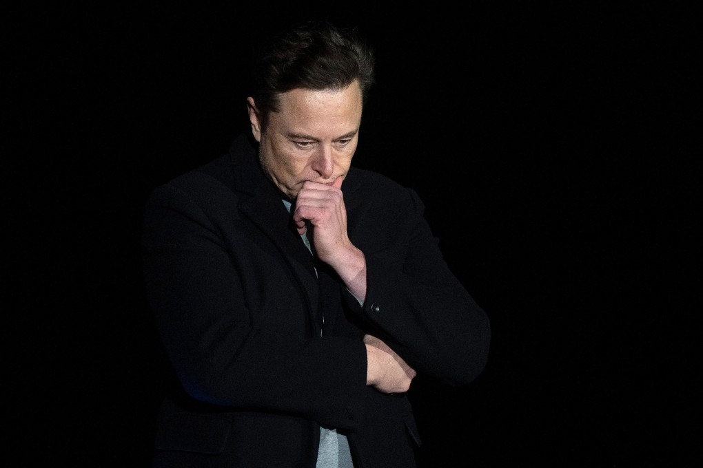 Elon Musk pauses and looks down as he speaks during a press conference at SpaceX’s Starbase facility near Boca Chica Village in South Texas, on February 10, 2022. Photo: AFP