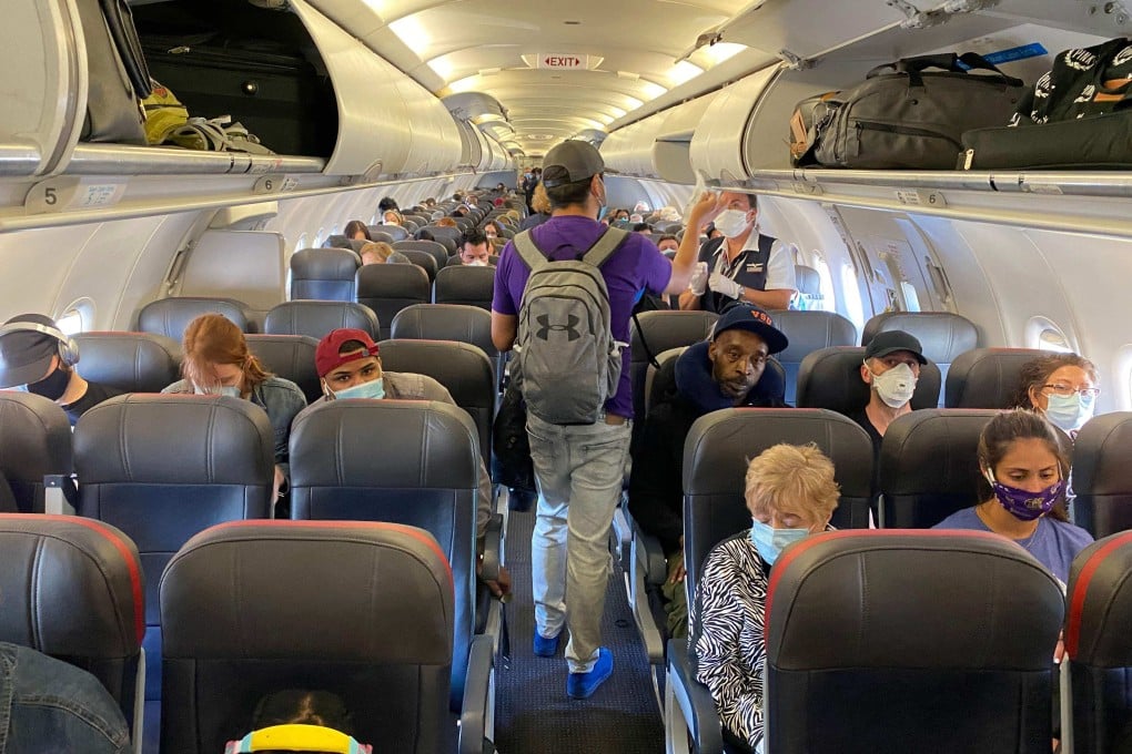 The US mask mandate has caused a surge in incidents between airline officials enforcing the mandate and passengers rejecting the demand they cover their faces. File photo: AFP