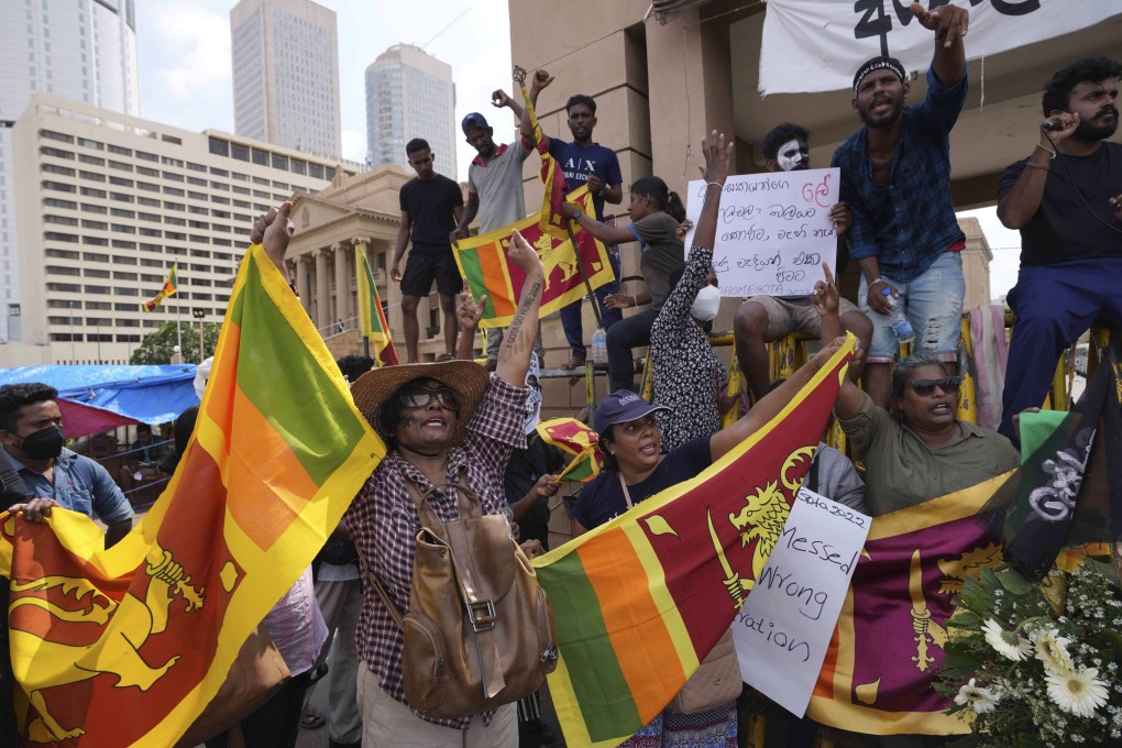 Sri Lankans shout slogans at the ongoing protest site against the economic crisis outside the president’s office in Colombo, Sri Lanka on Thursday. Photo: AP