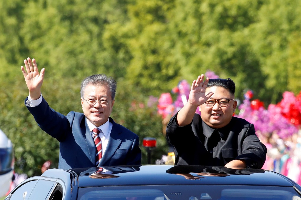 North Korean leader Kim Jong-un (right) and South Korean President Moon Jae-in at a car parade in Pyongyang. File photo: Reuters