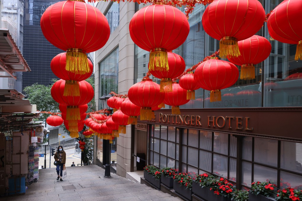 A woman walks up a deserted Pottinger Street in Central on February 15. Photo: Nora Tam