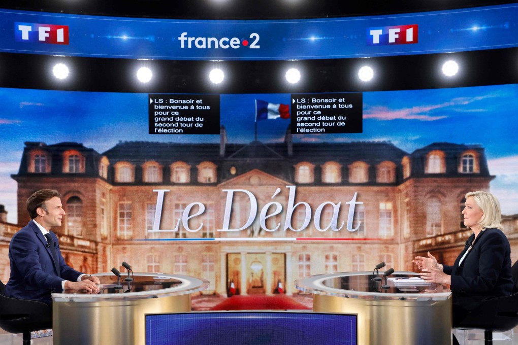 French President Emmanuel Macron and Rassemblement National candidate Marine Le Pen get ready for the start of a televised debate on French TV, in Saint-Denis on April 20. France will once again see a run-off presidential election between the centrist Macron and the far-right Le Pen. Photo: DPA