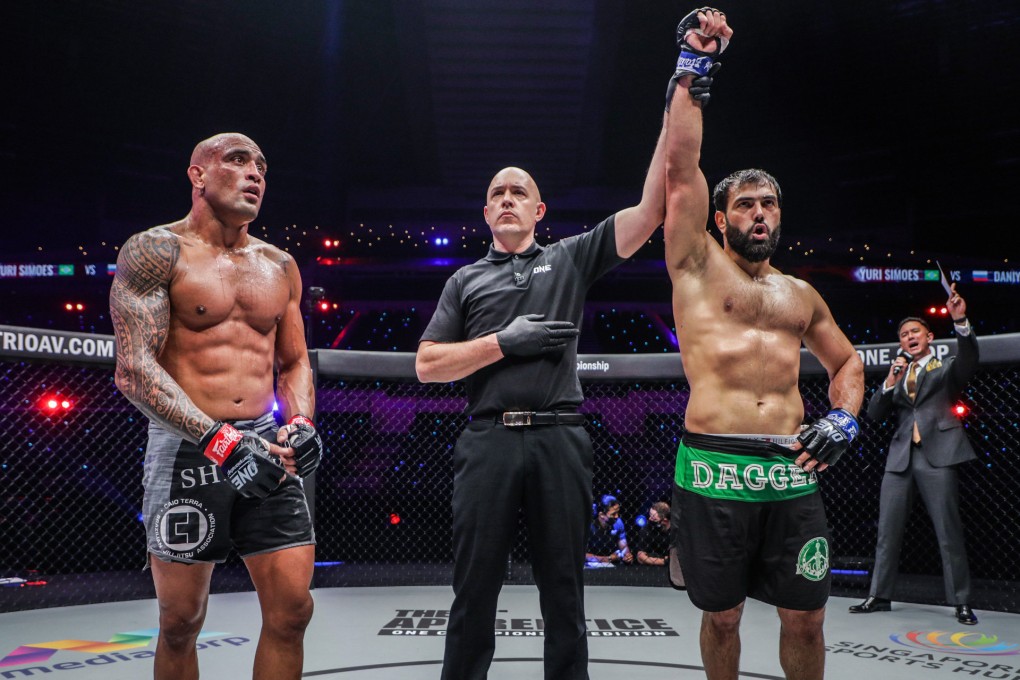 Daniyal Zainalov celebrates beating Yuri Simoes. Photo: One Championship